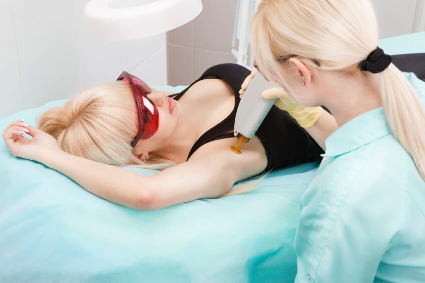 Female patient undergoing laser hair removal