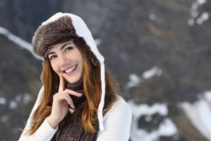 Woman wearing winter clothes headshot