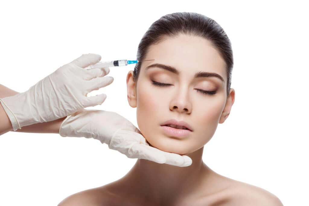 Female patient being injected with Botox