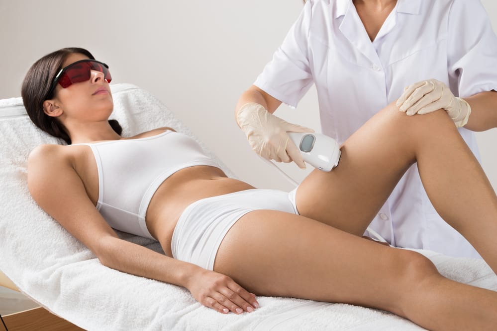 Woman undergoing laser hair removal